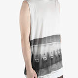 White top worn by a person, showing the top's fit