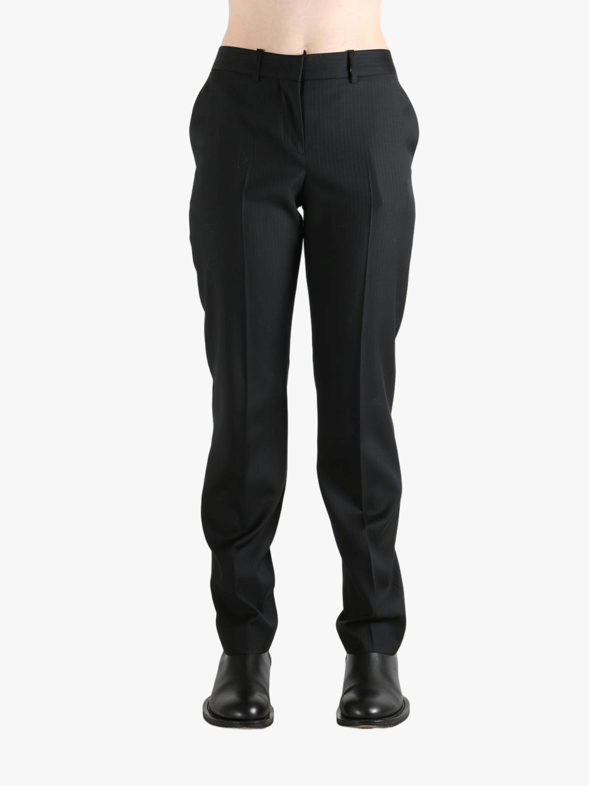 Grey pant worn by a person, showing the pant's fit