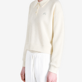 Tan hoodie worn by a person, showing the hoodie fit