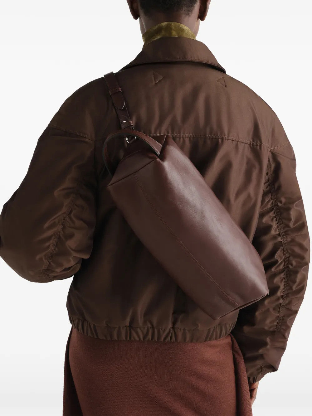 Brown bag worn by a person, showing the bag fit