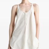 White tops worn by person,showing the tops fit