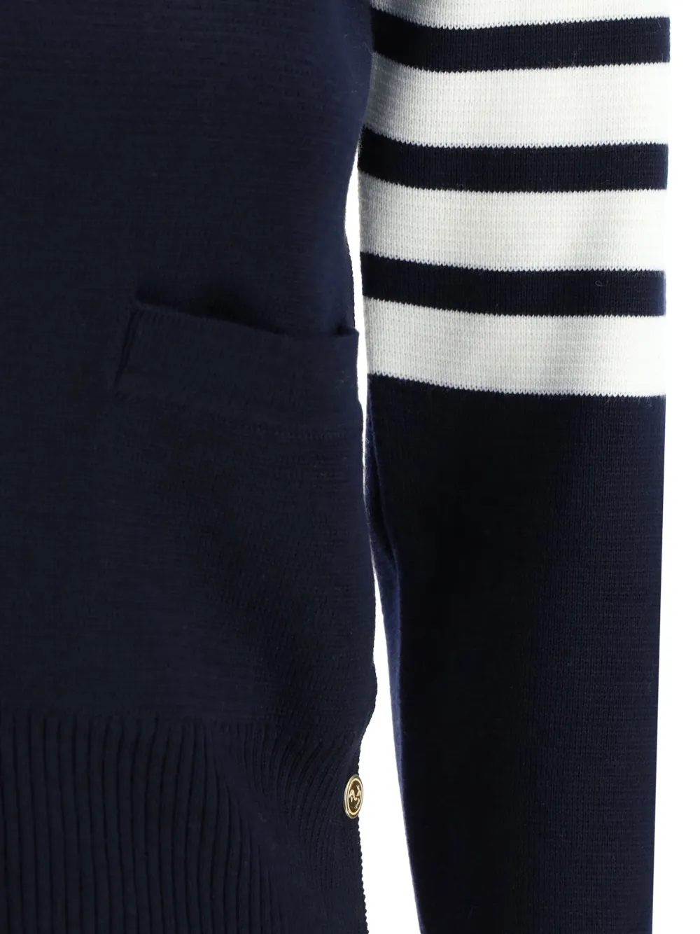 Close up of Navy knitwear, showing texture of the 100% cotton fabric
