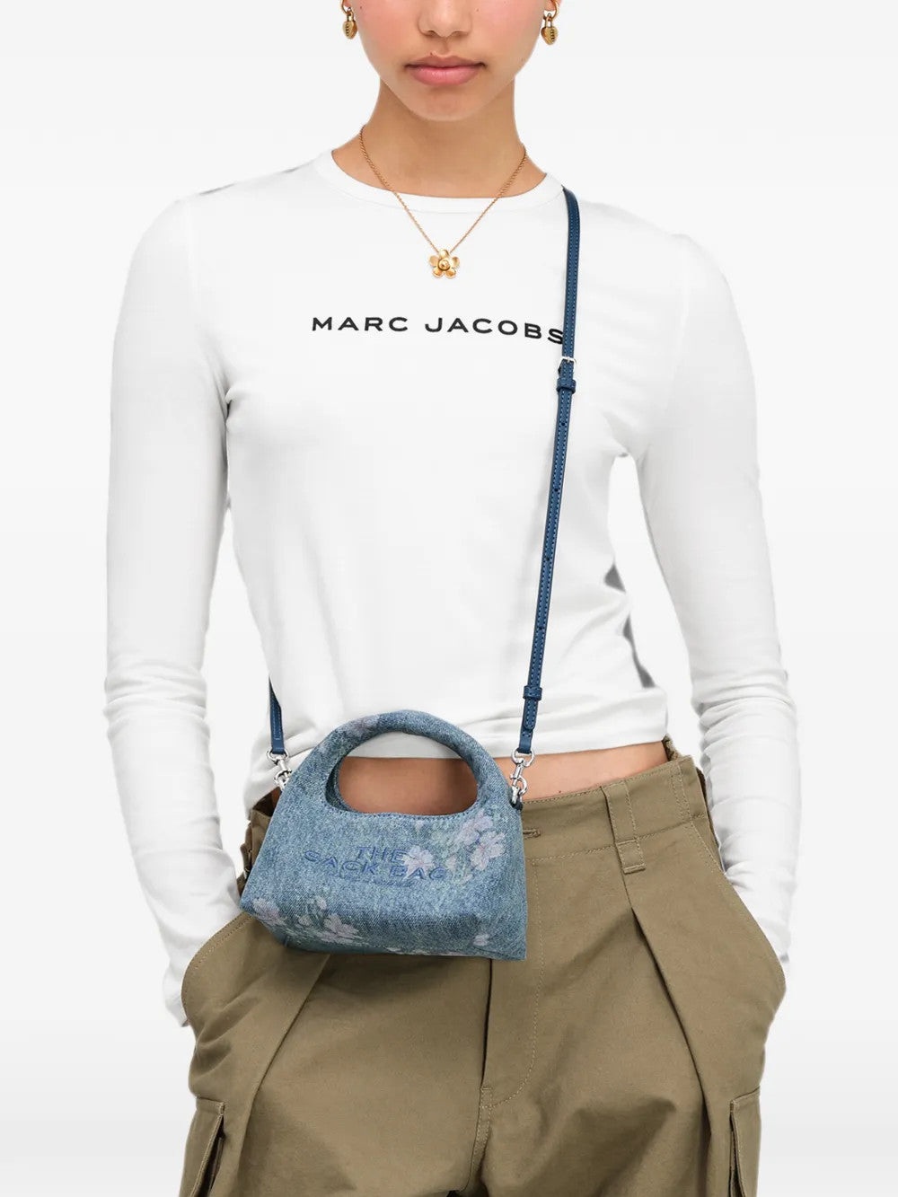 Blue bag worn by a person, showing the bag fit