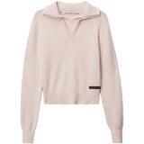 Pink knitwear, front view