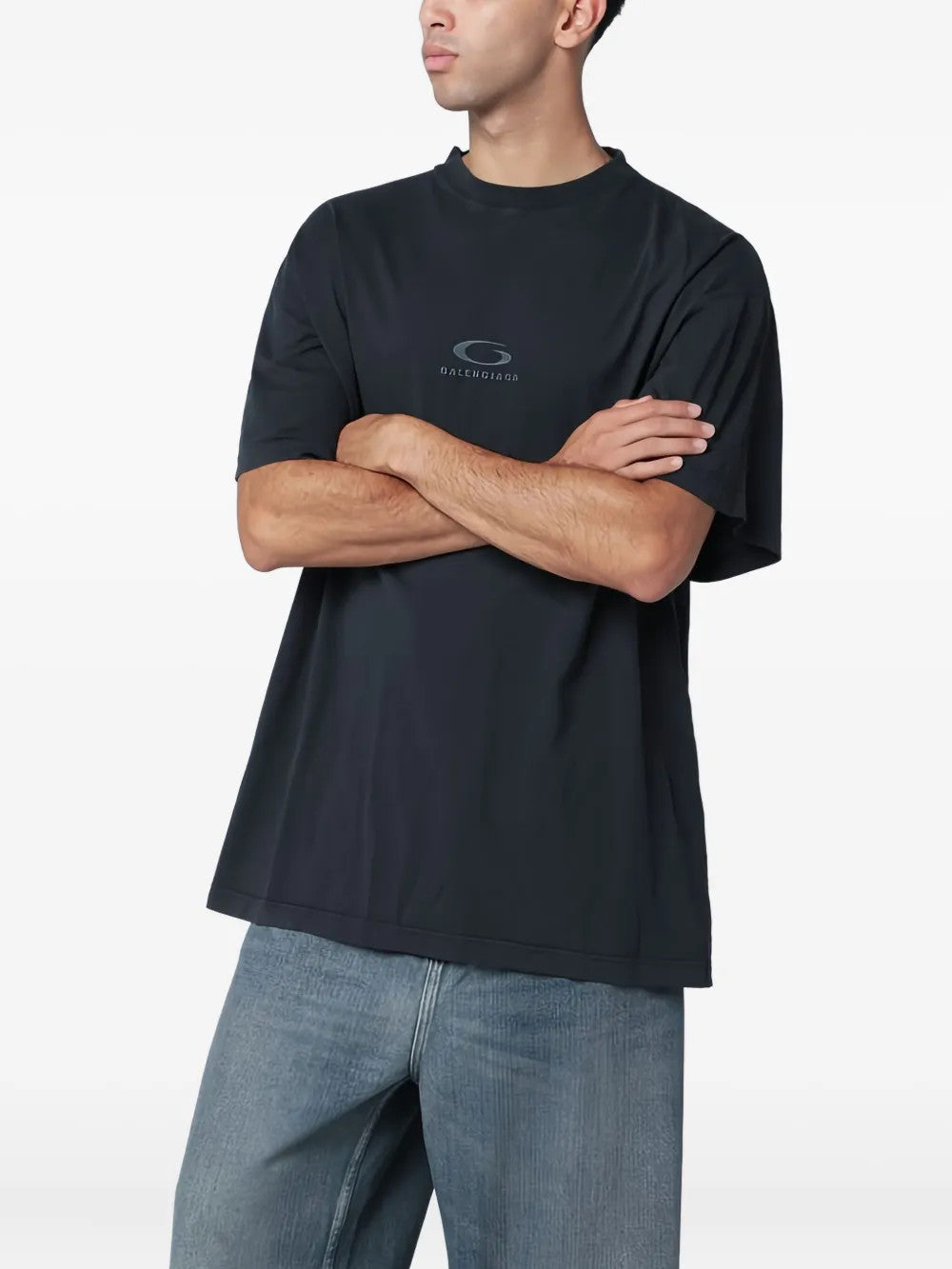 Black t-shirt worn by a person, showing the t-shirt fit