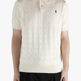 White shirt worn by a person, showing the shirt's fit