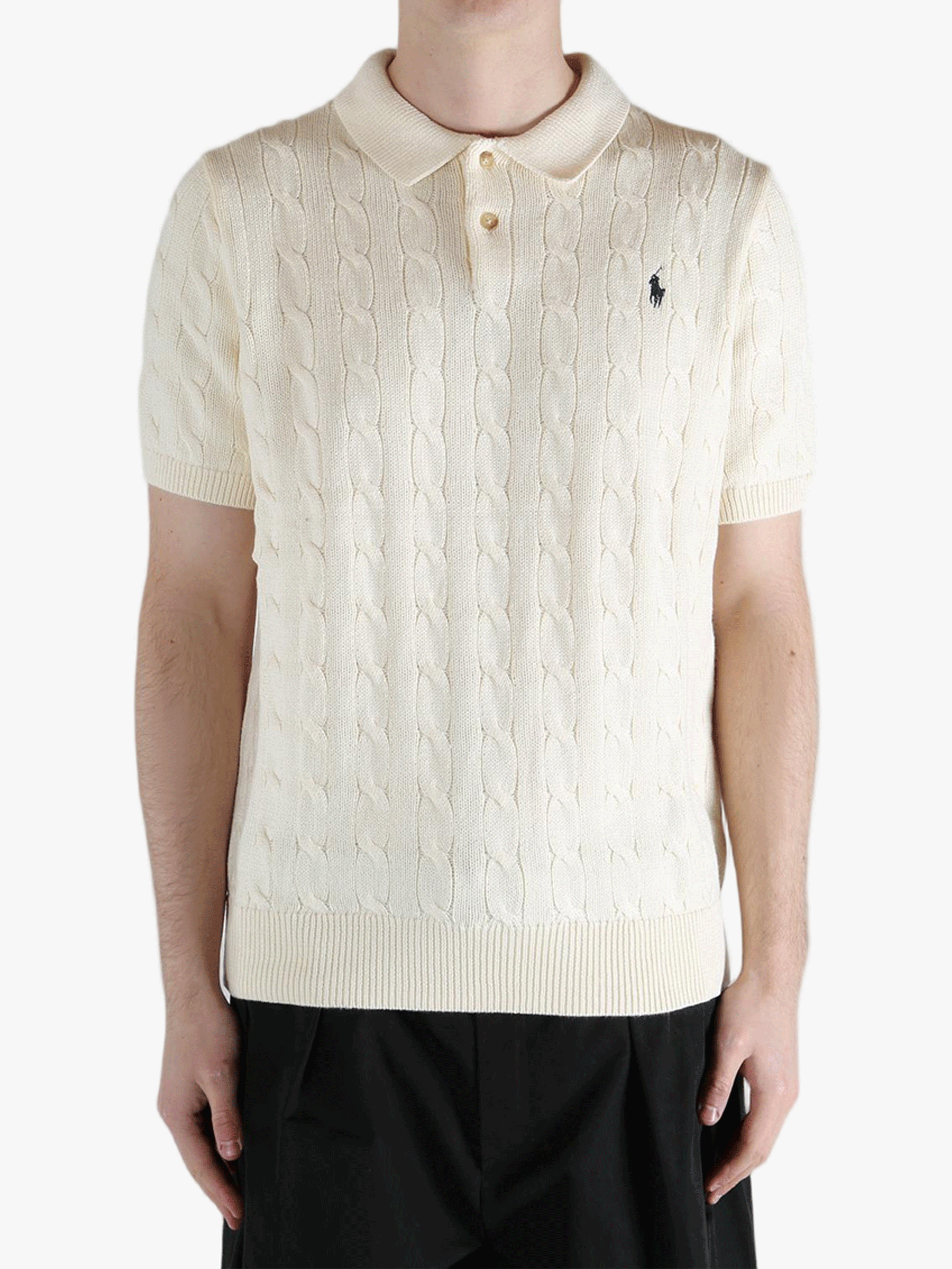 White shirt worn by a person, showing the shirt's fit