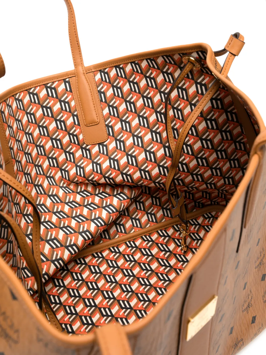 Close up of brown bag, showing texture of the leather fabric