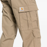 Close up of tan pants, showing texture of the cotton fabric