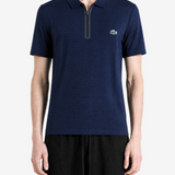 Navy shirt worn by a person, showing the shirt fit