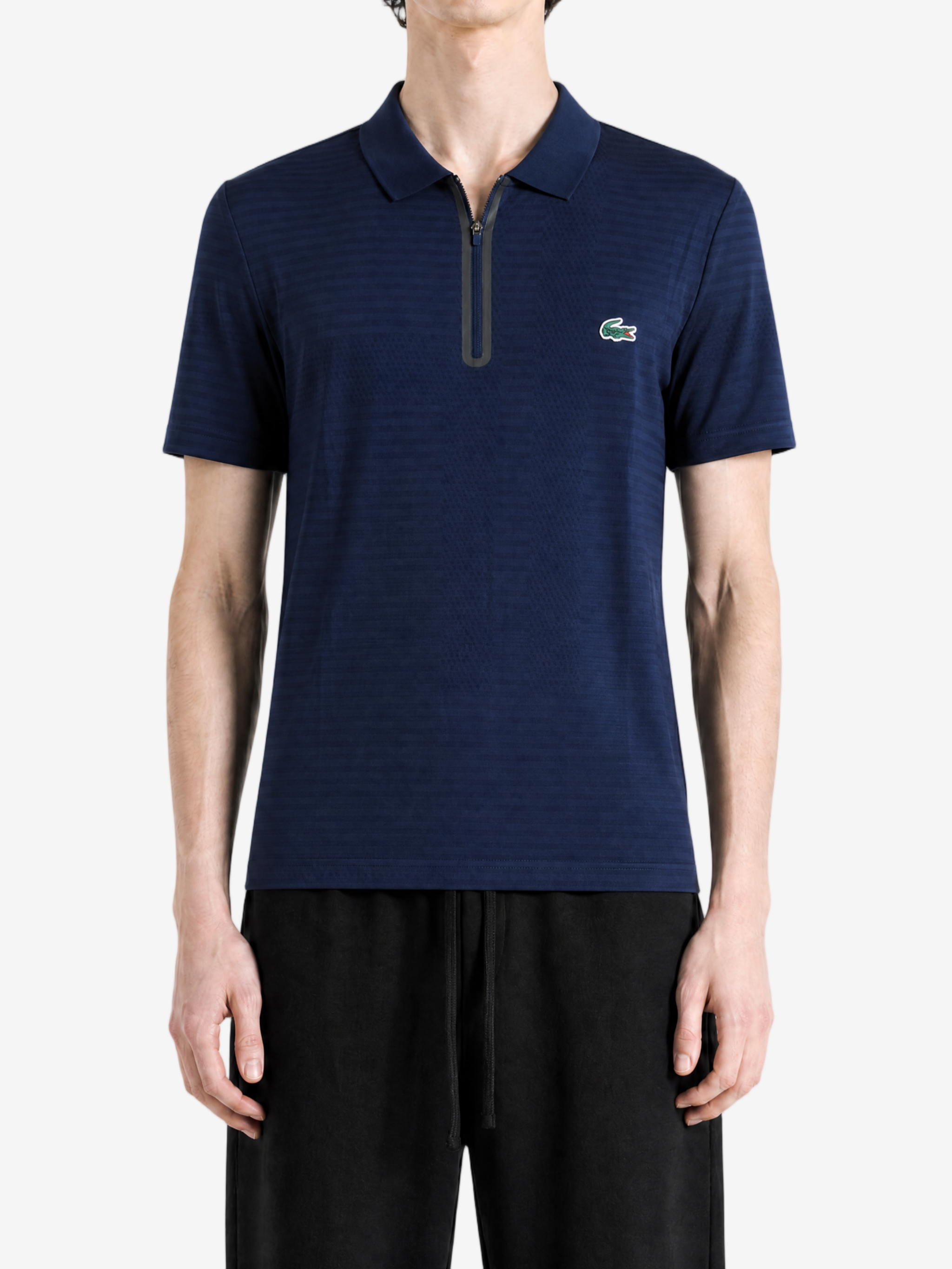 Navy shirt worn by a person, showing the shirt fit