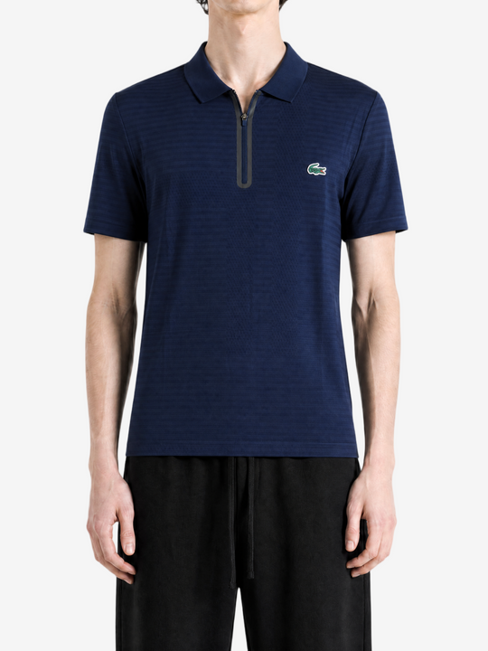 Navy shirt worn by a person, showing the shirt fit