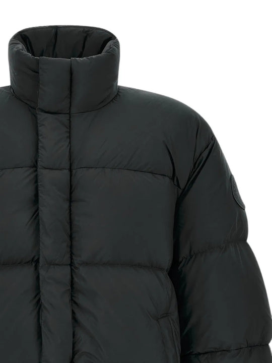 Close up of Black jacket, showing texture of the 100% polyester fabric