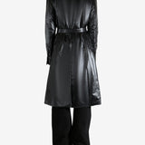 Black coat worn by a person, showing the coat's fit