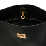 Close up of black bags, showing texture of the calf leather fabric