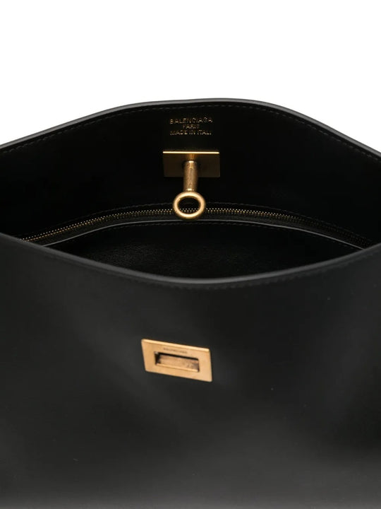 Close up of black bags, showing texture of the calf leather fabric