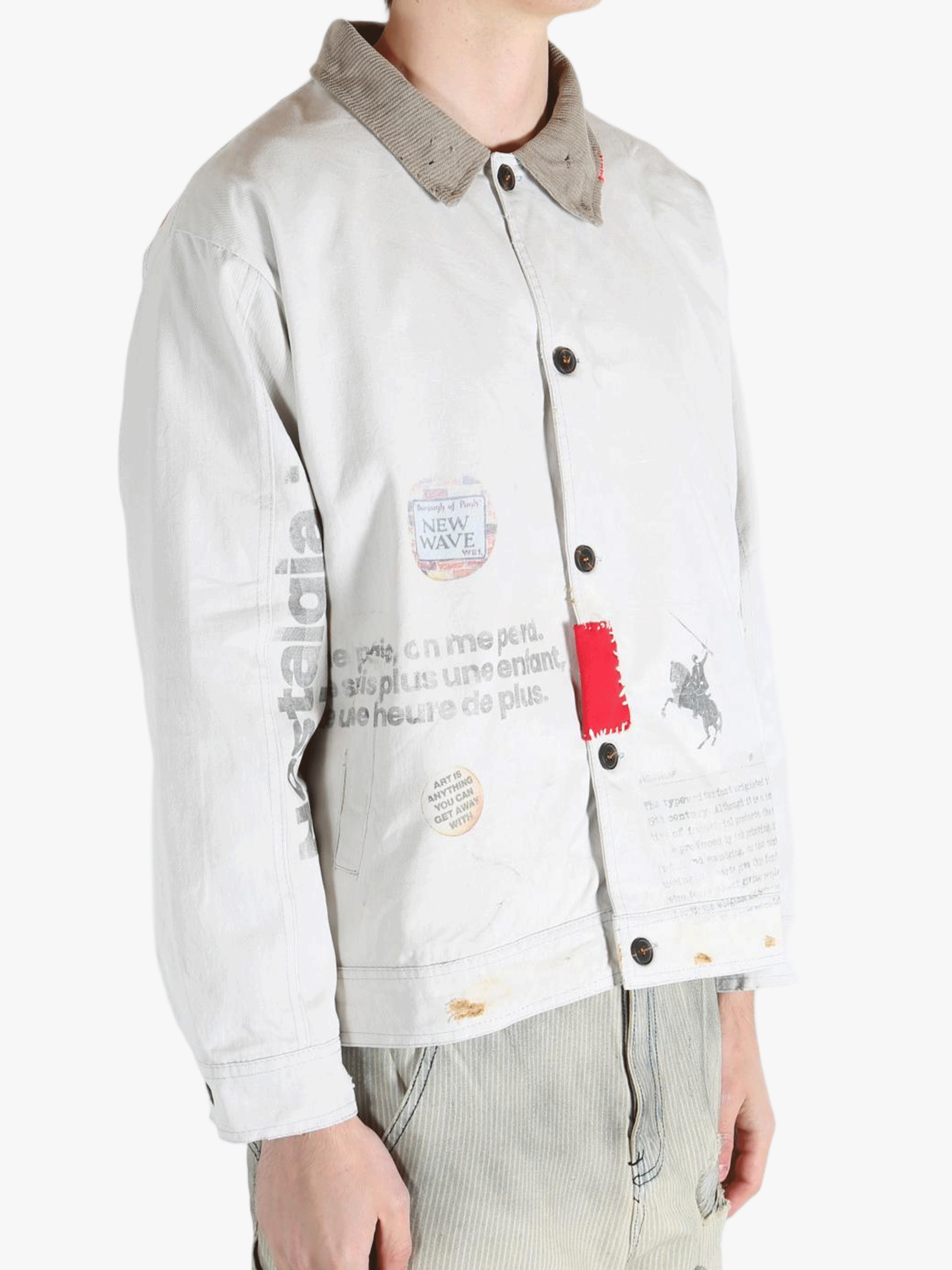 Grey jacket worn by a person, showing the jacket's fit