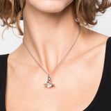 Grey jewelry worn by a person, showing the jewelry fit