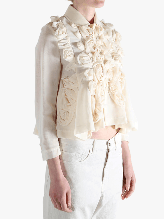 Tan jacket worn by a person, showing the jacket fit