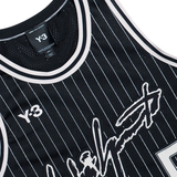 close up of black t-shirts , showing texture of the  recycled polyester fabric