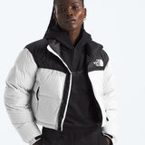 White jacket worn by a person, showing the jacket fit