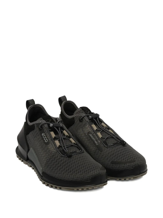 Black sneakers, side view