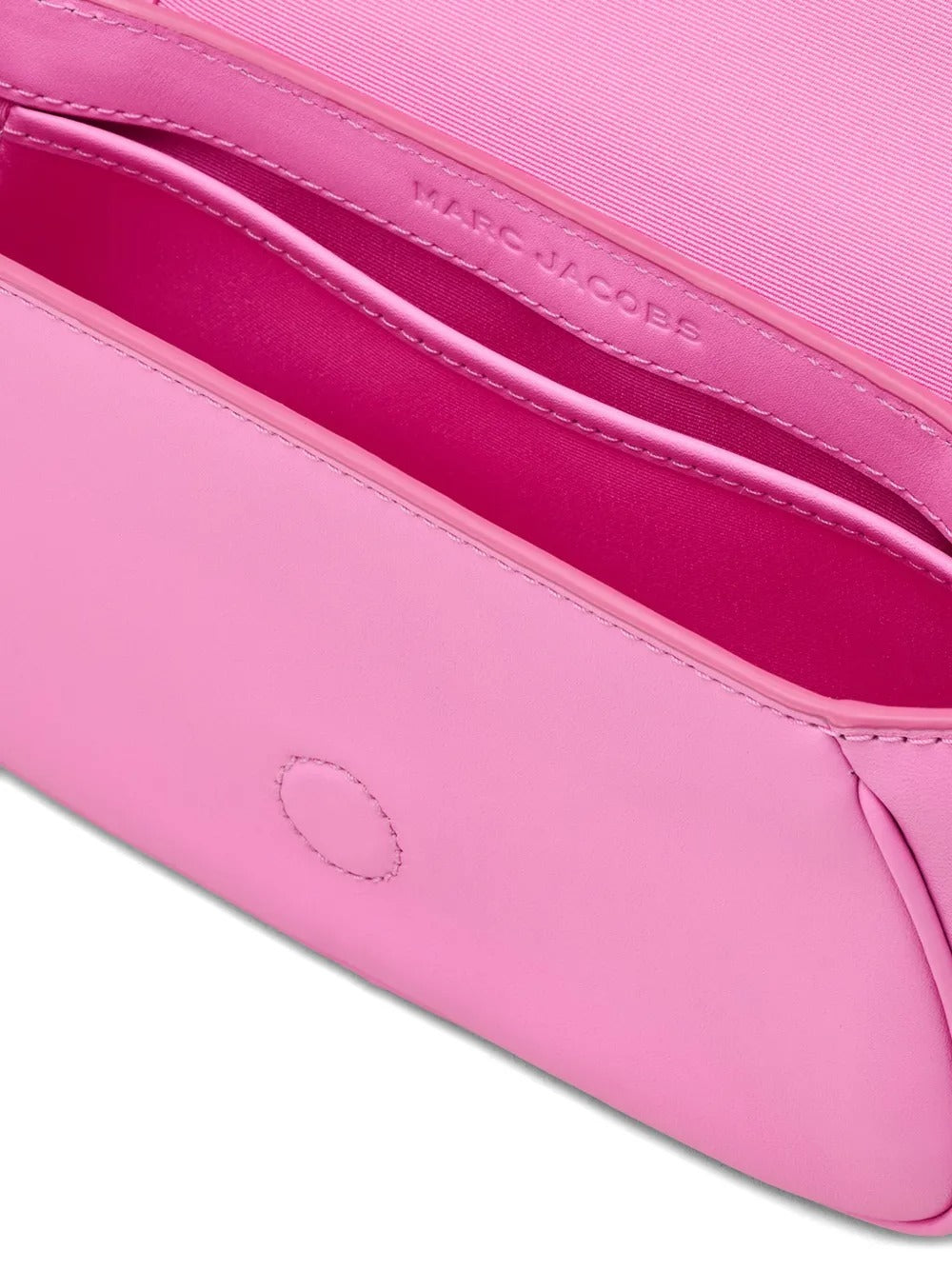 Close up of pink bag, showing texture of the cow leather fabric