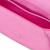 Close up of pink bag, showing texture of the cow leather fabric