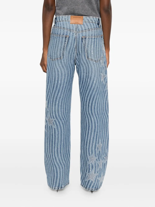 Blue pants worn by a person, showing the pants fit