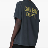 Black t-shirt worn by a person, showing the t-shirt's fit