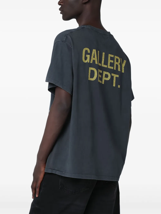 Black t-shirt worn by a person, showing the t-shirt's fit