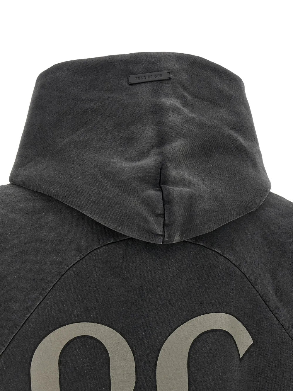 Black hoodie worn by a person, showing the hoodie fit