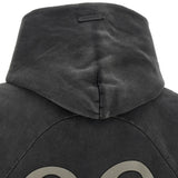Black hoodie worn by a person, showing the hoodie fit