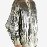 Yellow jacket worn by a person, showing the jacket's fit