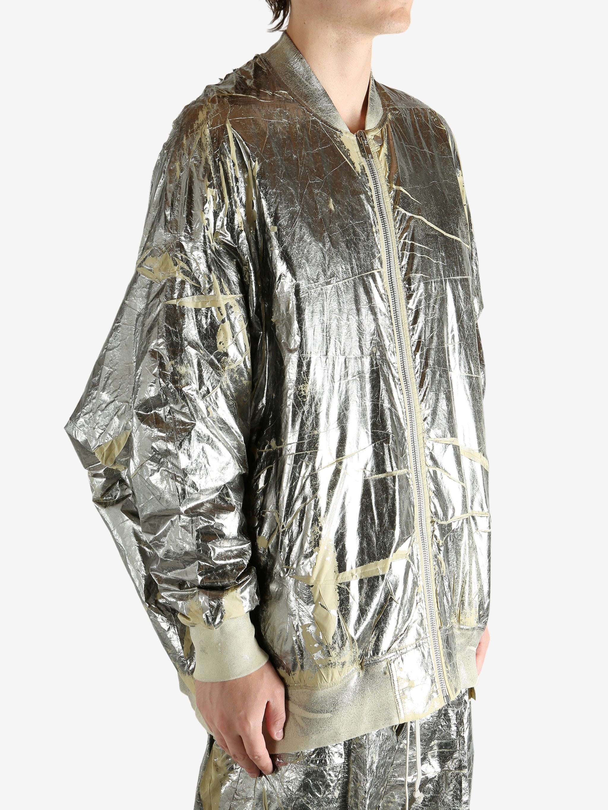 Yellow jacket worn by a person, showing the jacket's fit