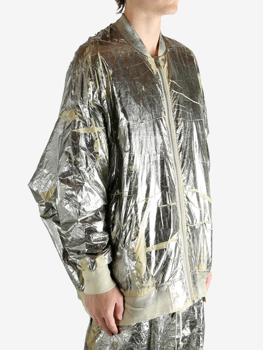 Yellow jacket worn by a person, showing the jacket's fit