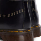Close up of black shoes, showing texture of the leather fabric