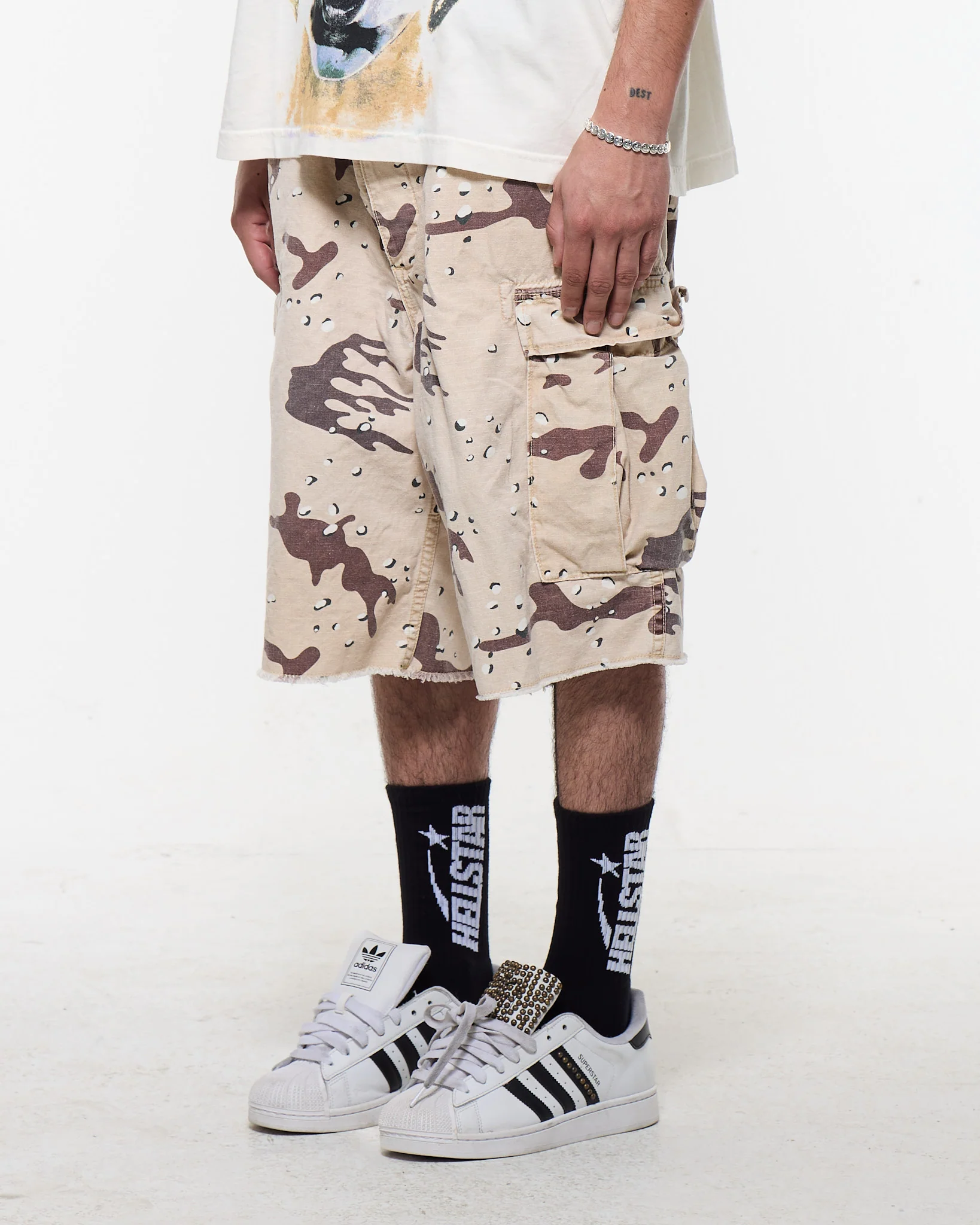 Brown shorts worn by a person, showing the shorts fit