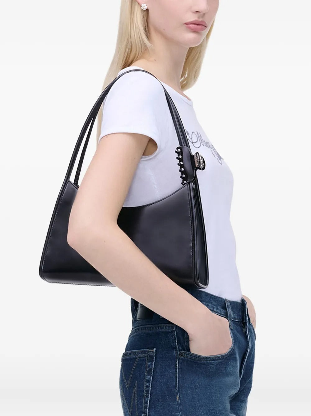Black bag worn by a person, showing the bag's fit