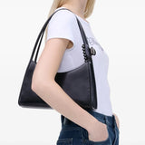 Black bag worn by a person, showing the bag's fit