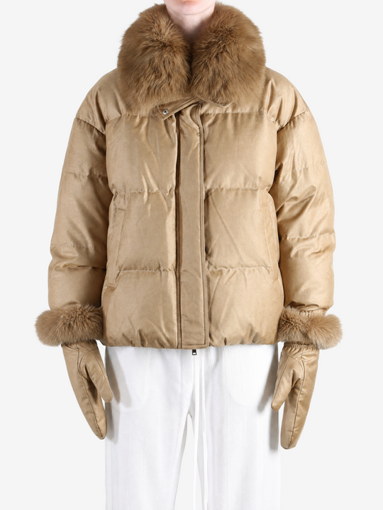Tan jacket worn by a person, showing the jacket fit