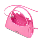 Close up of the pink bag, showing texture of the leather fabric