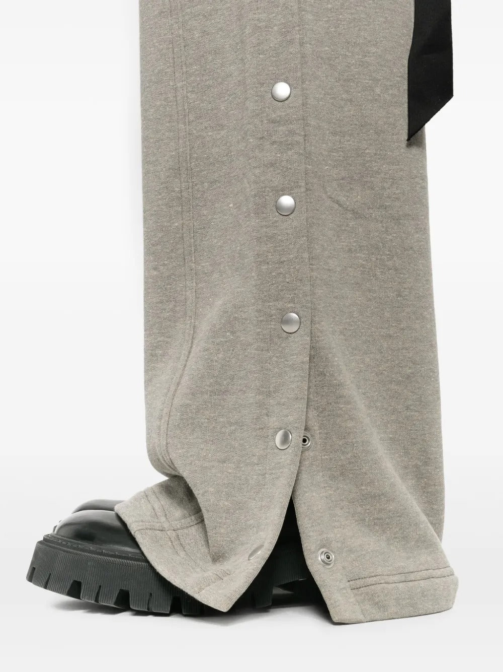 Close up of the grey pants, showing texture of the cotton fabric