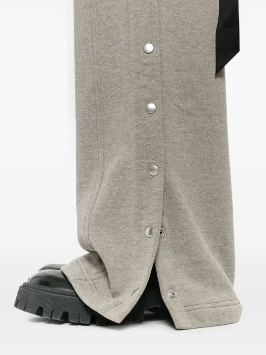 Close up of the grey pants, showing texture of the cotton fabric