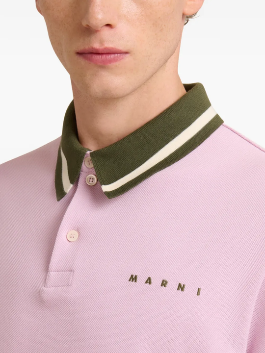 Close up of pink t-shirt, showing texture of the Cotton fabric