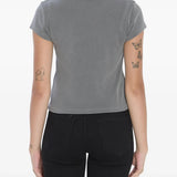 Grey t-shirt worn by a person, showing the shirt's fit