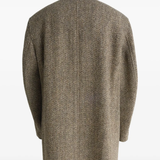 Close up of Tan coat, showing texture of the cotton fabric