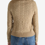 Tan pullover worn by a person, showing the pullover's fit