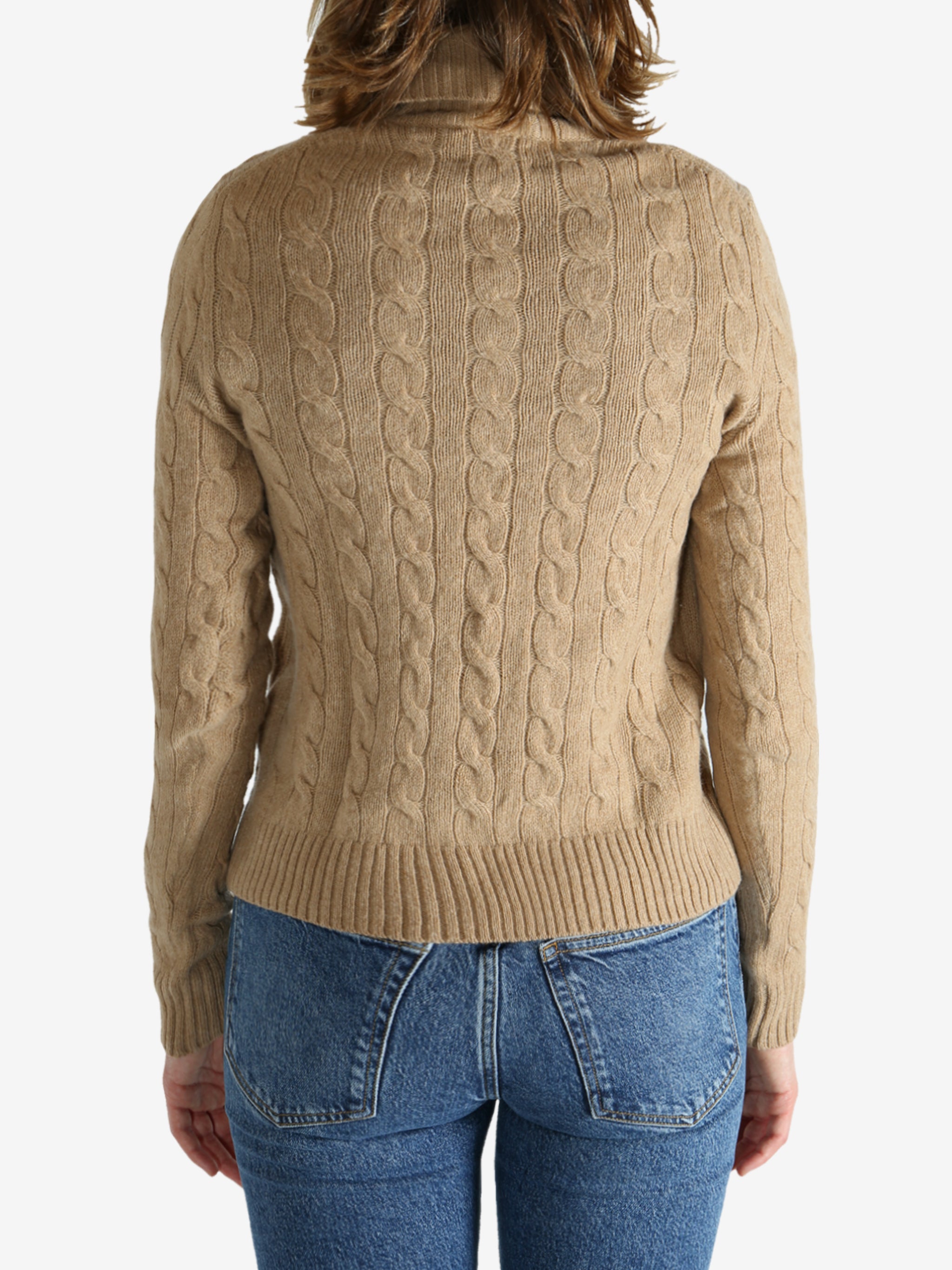 Tan pullover worn by a person, showing the pullover's fit