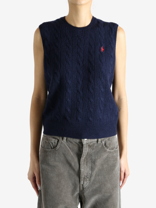 Navy sweater worn by a person, showing the sweater's fit